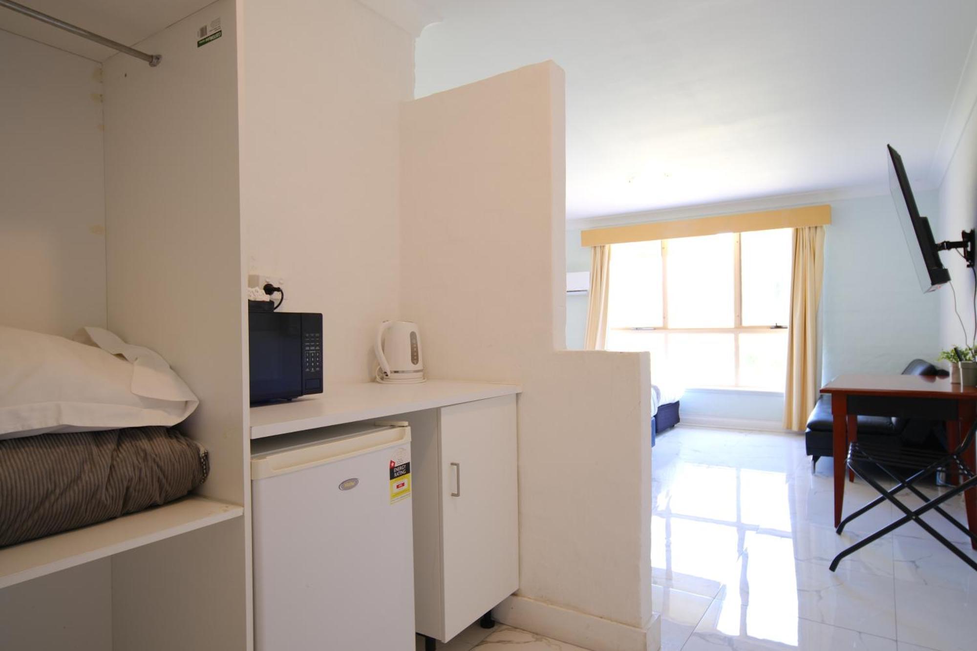 Golf Place Inn Wollongong Primbee Extérieur photo