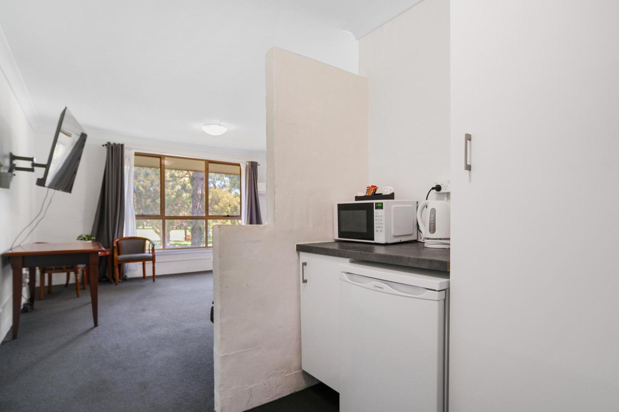 Golf Place Inn Wollongong Primbee Extérieur photo