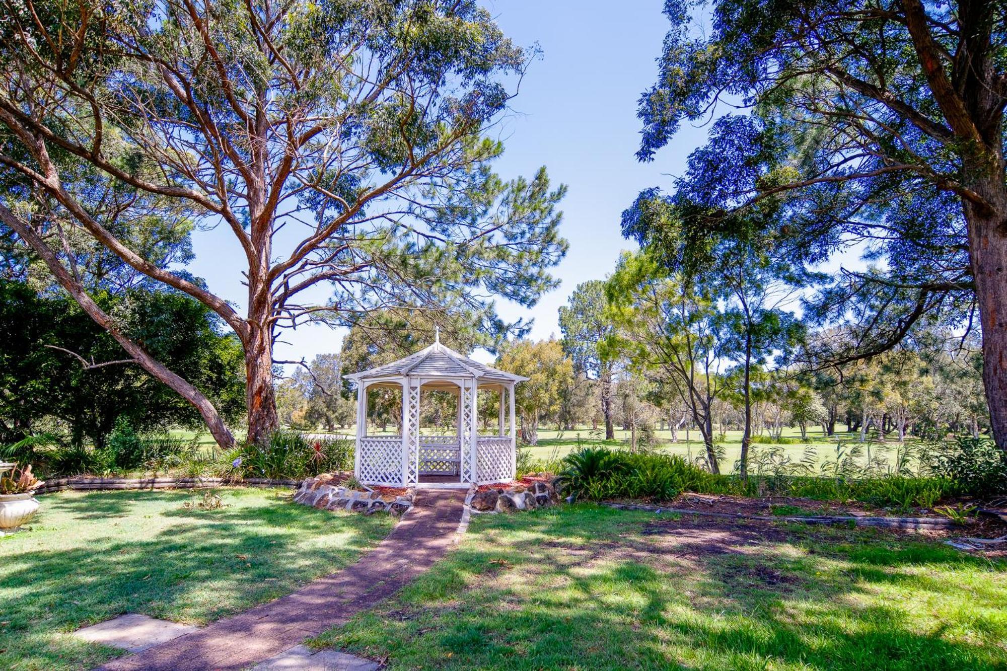 Golf Place Inn Wollongong Primbee Extérieur photo