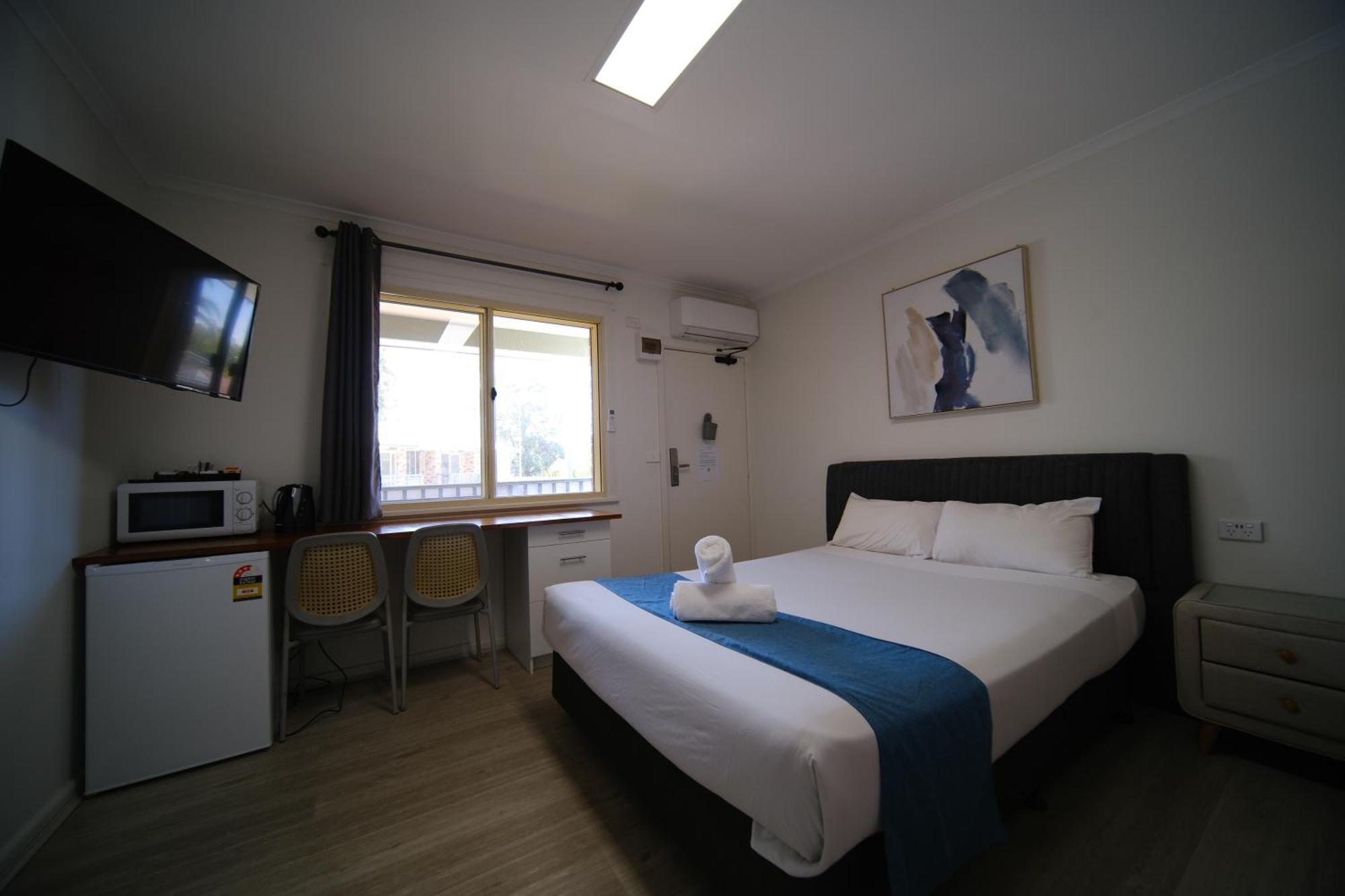 Golf Place Inn Wollongong Primbee Extérieur photo